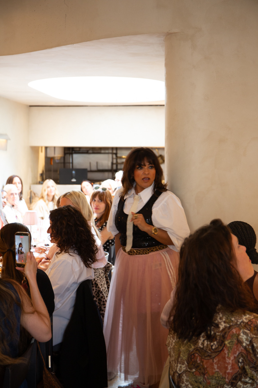 Nishma speaking to the room at a Glittersphere event